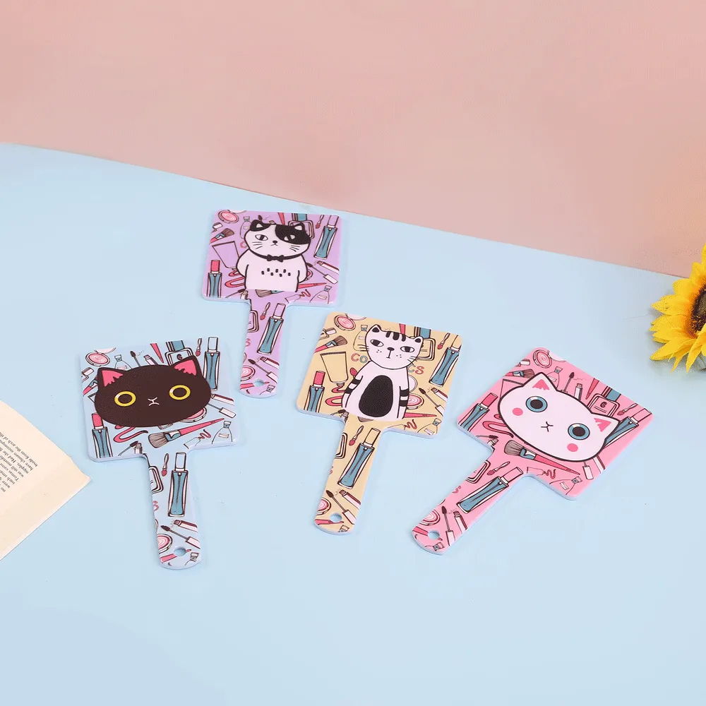 Kitty Mix print handheld mirror